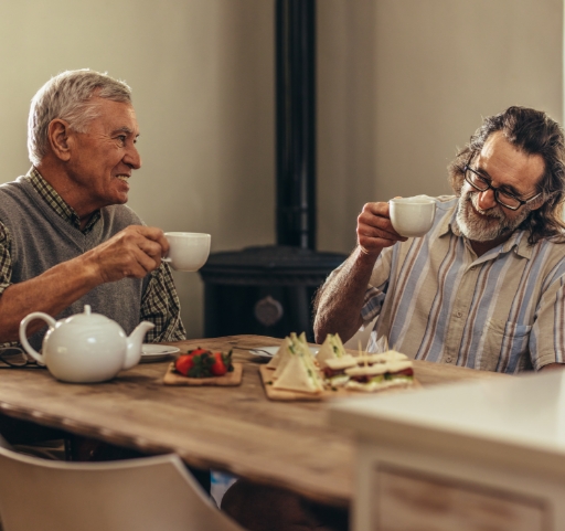 A photo of two man drinking coffee while waiting for HVAC services in Southern Springs, Indianapolis, IN