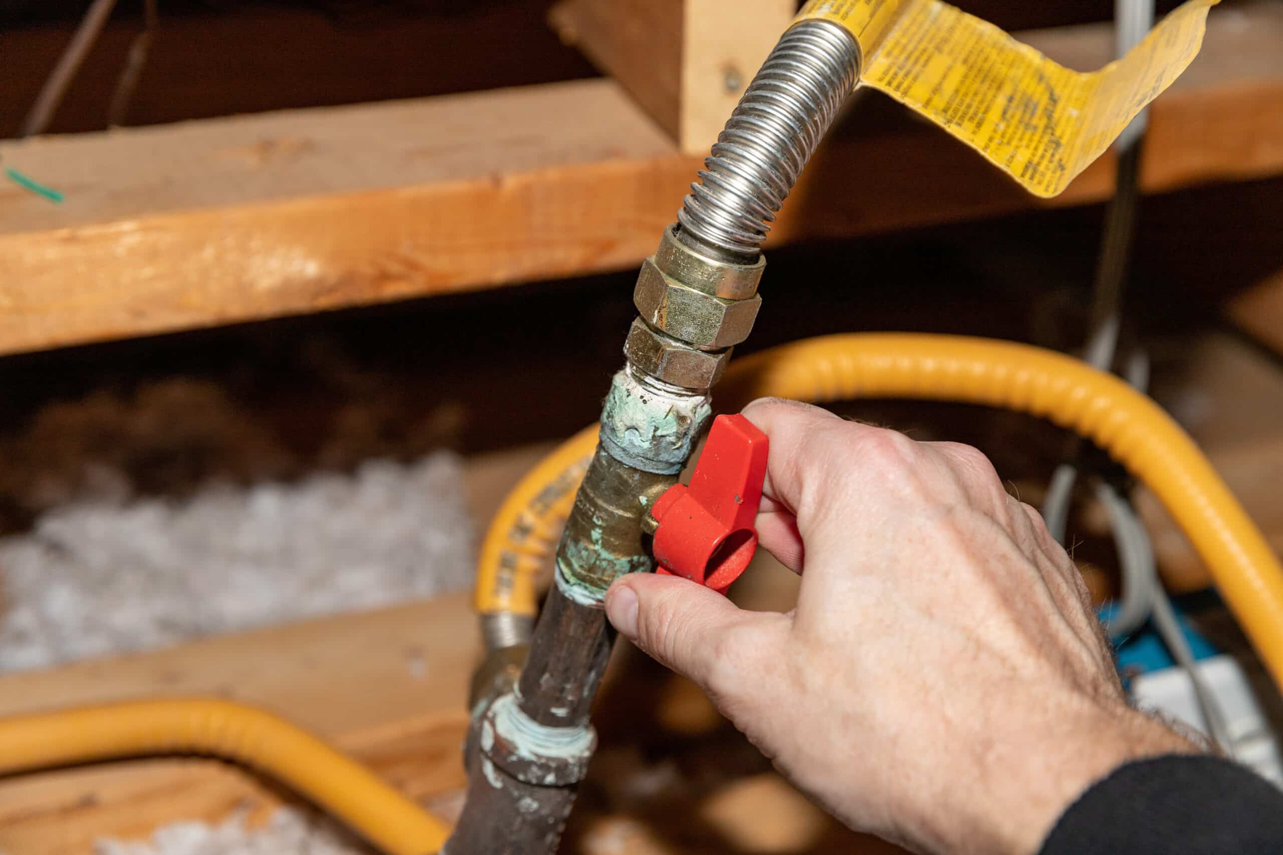 Brewer technician repairing gas line in a Beech Grove home